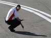 Test Valencia primi km, 2010 Formula One Testing
Valencia, Spain. 1st February 2010.
A Bridgestone team member checks the track temperature.   
World Copyright: Steven Tee/LAT Photographic 
ref: Digital Image _A8C1097